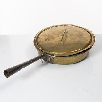 A Swedish brass lidded saucepan, 18th century.