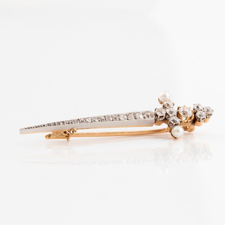 An 18K gold sword brooch set with old-cut diamonds and pearls.