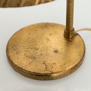 Paavo Tynell, a 1940s '5321' 'The Shell' table lamp for Taito.