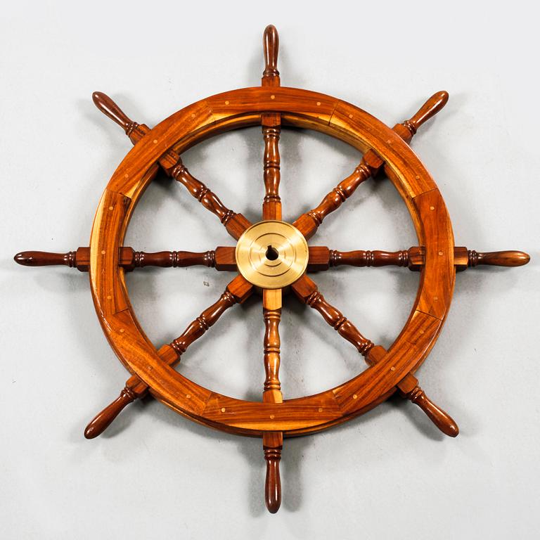 A 20th century boat steering wheel.