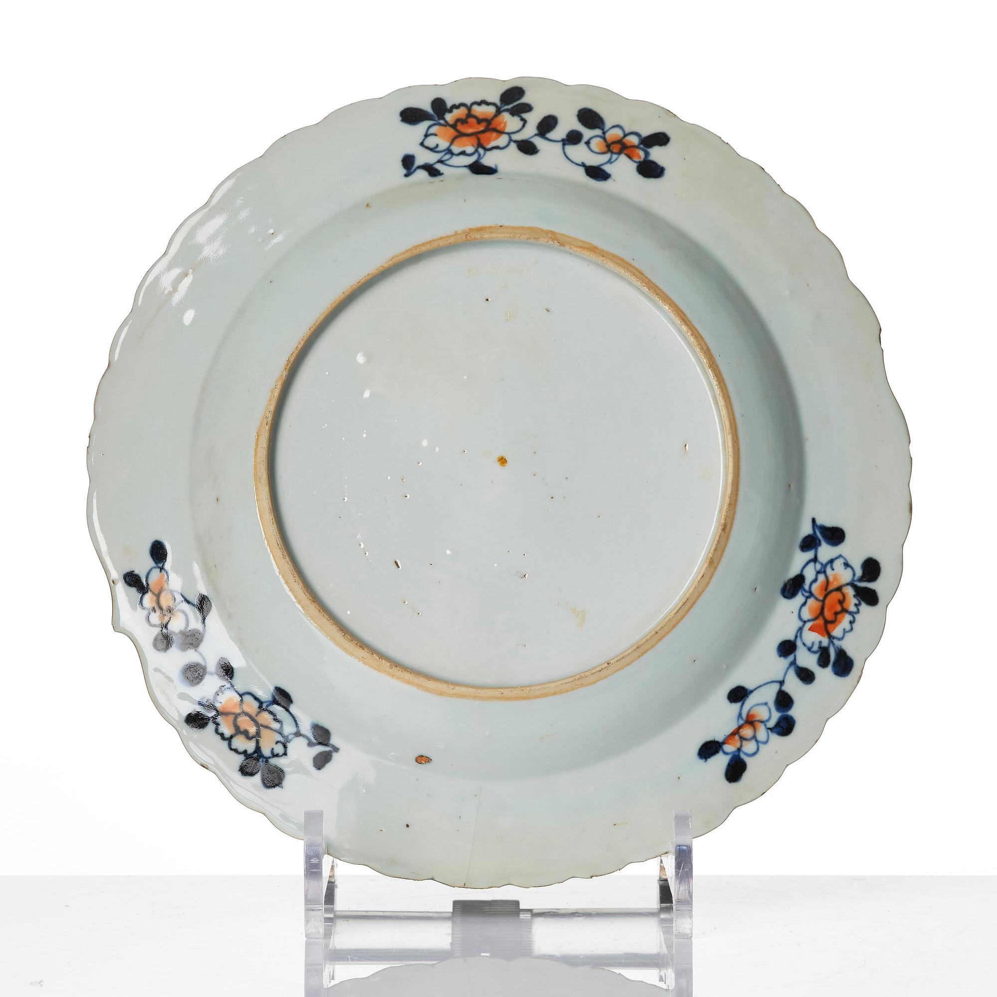 A set of three famille rose 'tobacco leaf' plates, Qing dynasty, Qianlong (1736-95).