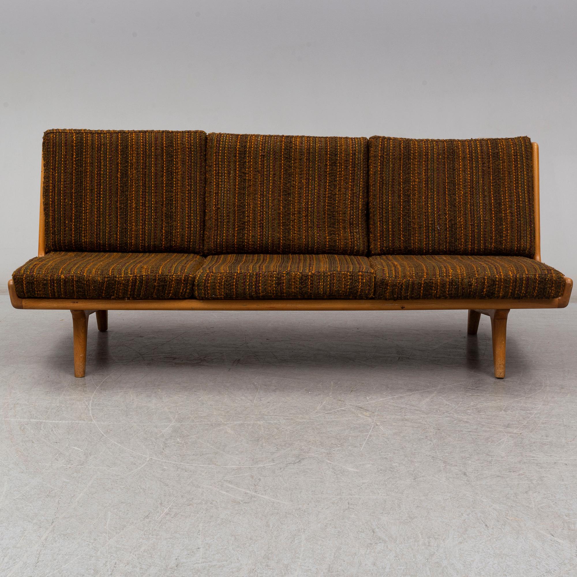 CARL GUSTAF HIORT AF ORNÄS, an oak 'Studio' sofa from Puunveisto Oy - Träsnideri Ab, designed in 1954.