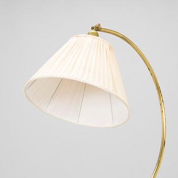 A mid-20th century floor lamp.