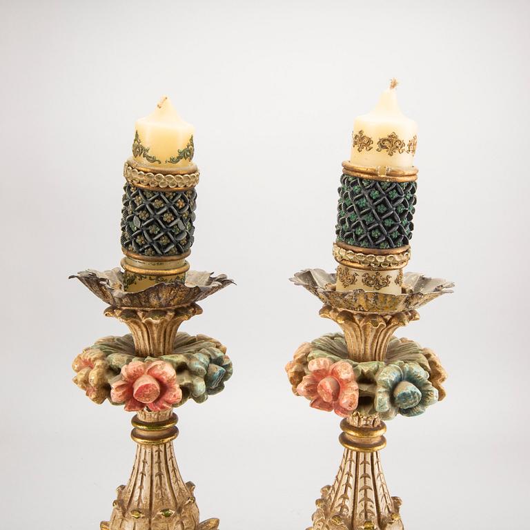 A pair mid 20th century wood candle sticks from Paoletti, Firenze Italy.