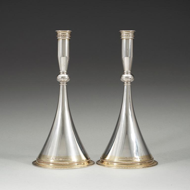 A pair Wiwen Nilsson sterling, partly gilt, candelsticks, Lund 1957.