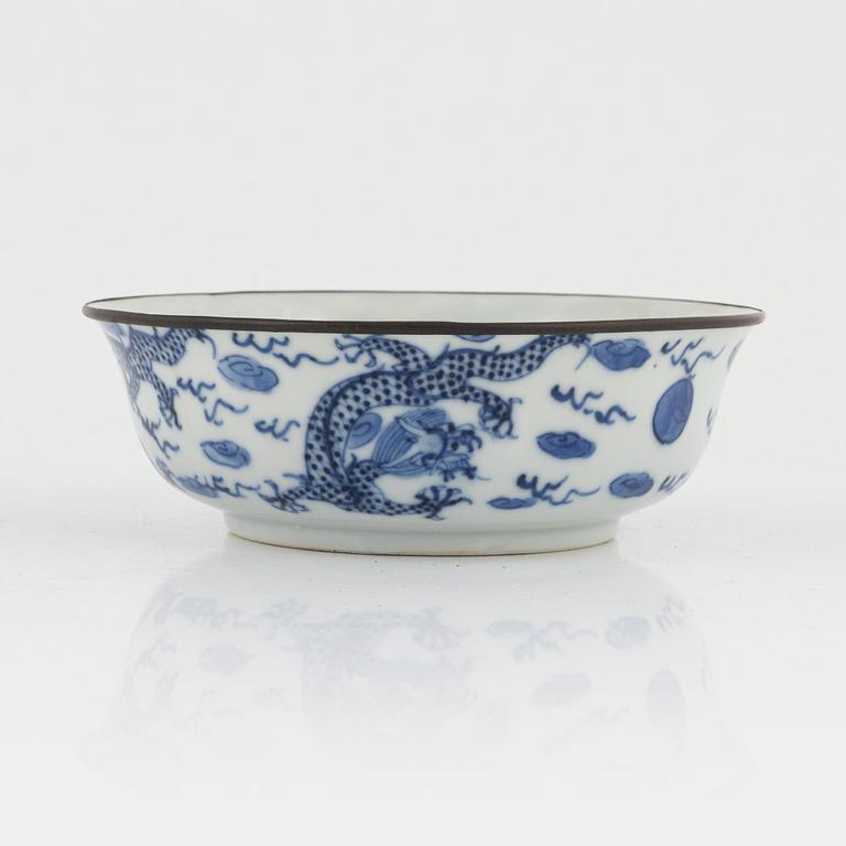 Two blue and white porcelain bowls and a lid, China, Ming dynasty and late Qing dynasty.