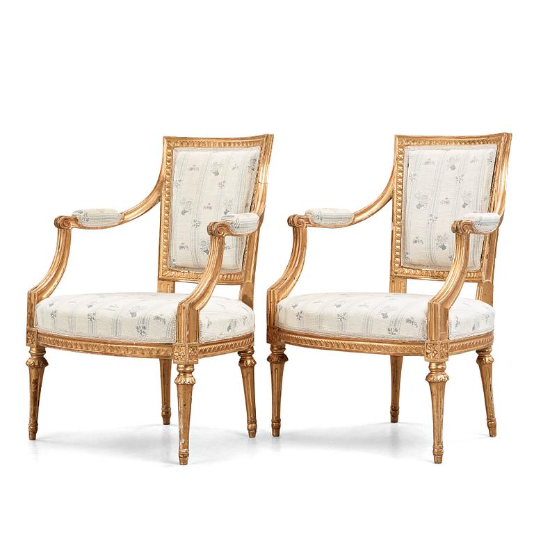 Two matched Gustavian late 18th century armchairs.