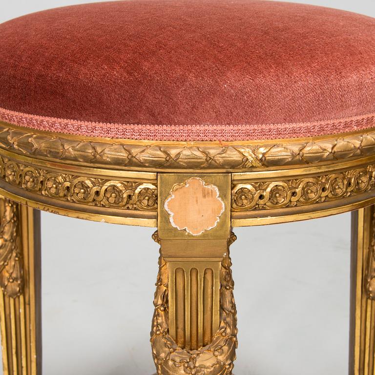 Armchair and stool, Louis XVI style, circa 1900.