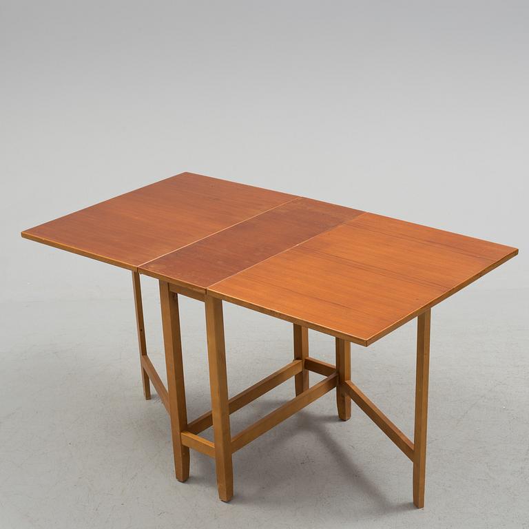 A mid 20th century flap table.