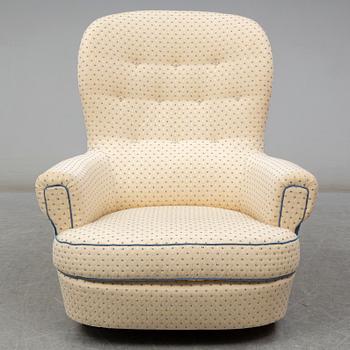 A Carl Malmsten "Jättepaddan" armchair, late 20th or early 21th century.