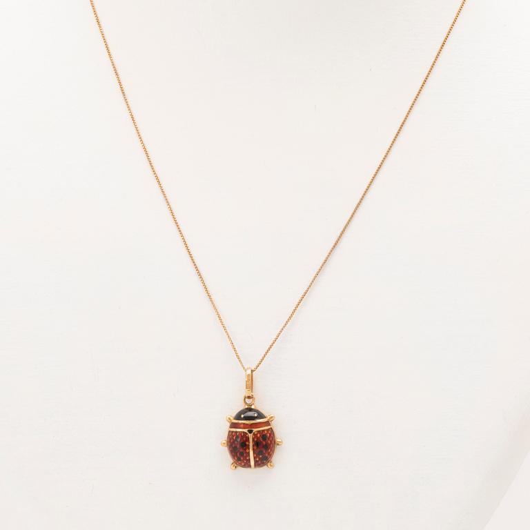 An 18K gold and enamel necklace.