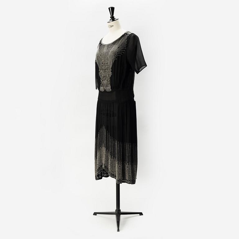 A 1920's pearl embroidered dress.