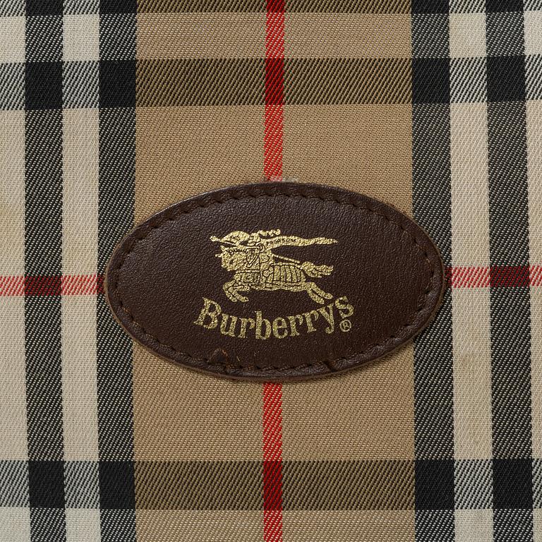 Burberry, a tennis bag.