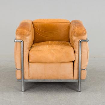 A 'LC3' easy chair by Pierre Jeanneret & Charlotte Perriand. Le Corbusier for Cassina.