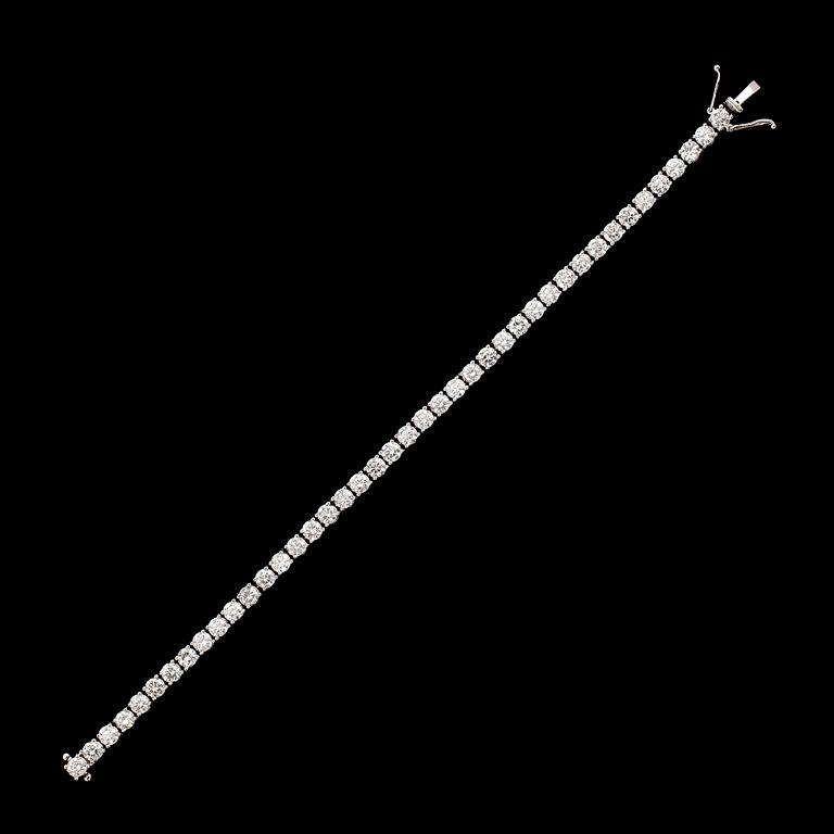 ARMBAND, 18 k vitguld, rivièrelänk, 42 briljantslipade diamanter tot ca 9.11 ct.