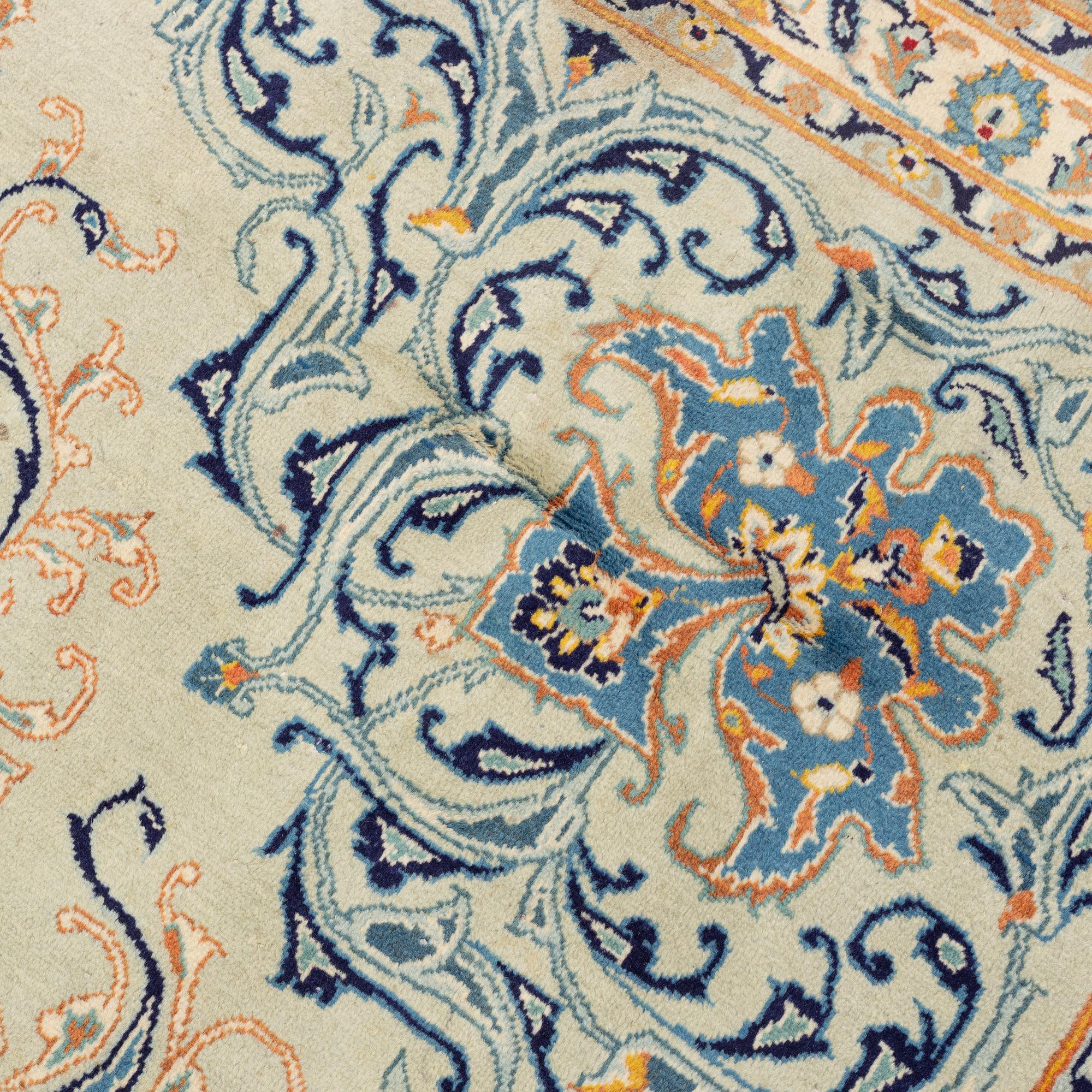 A signed Kashan, carpet ca 450 x 335 cm.