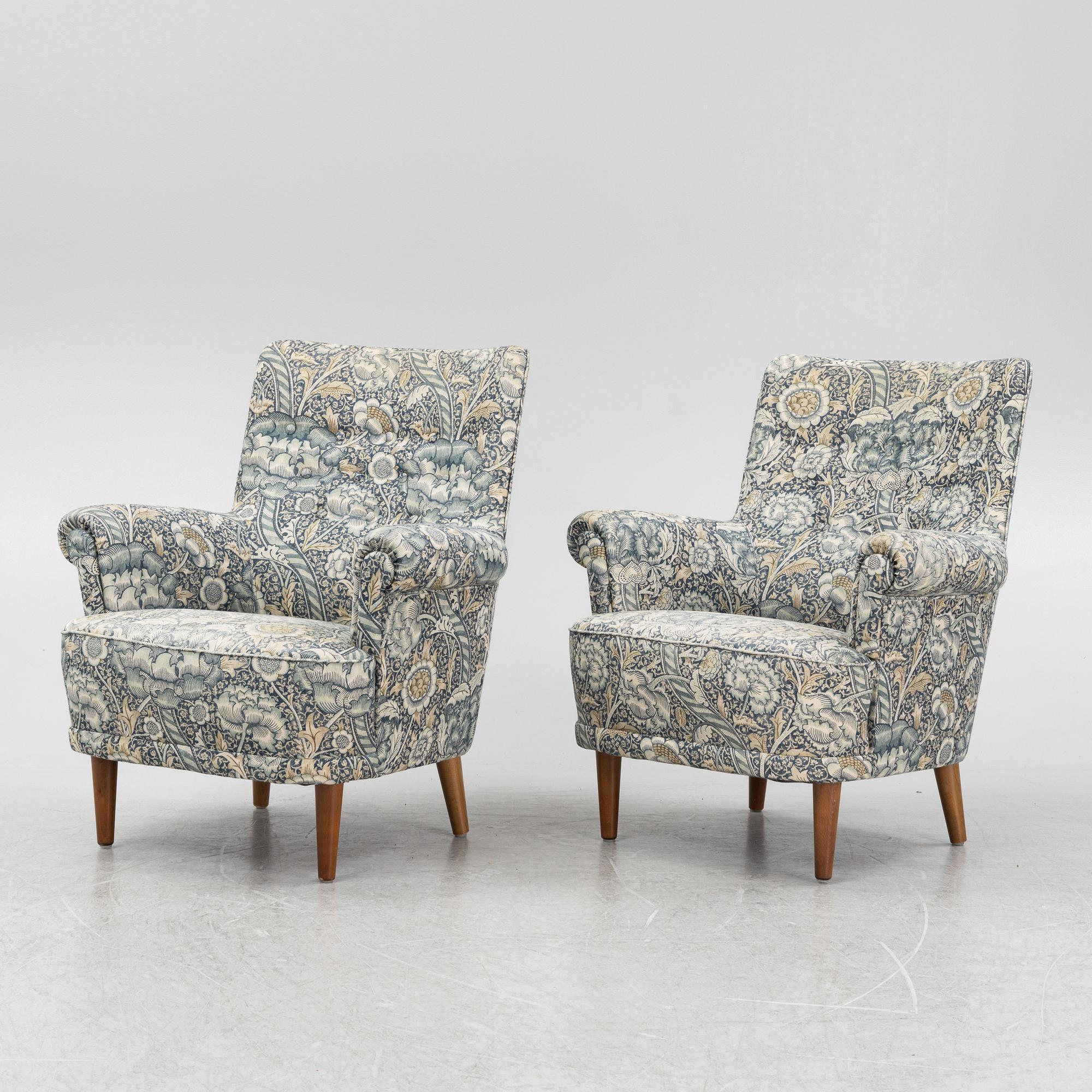 Carl Malmsten, a pair of Hemmakväll easy chairs .