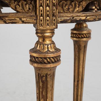 A Louis XVI-style table, circa 1900.