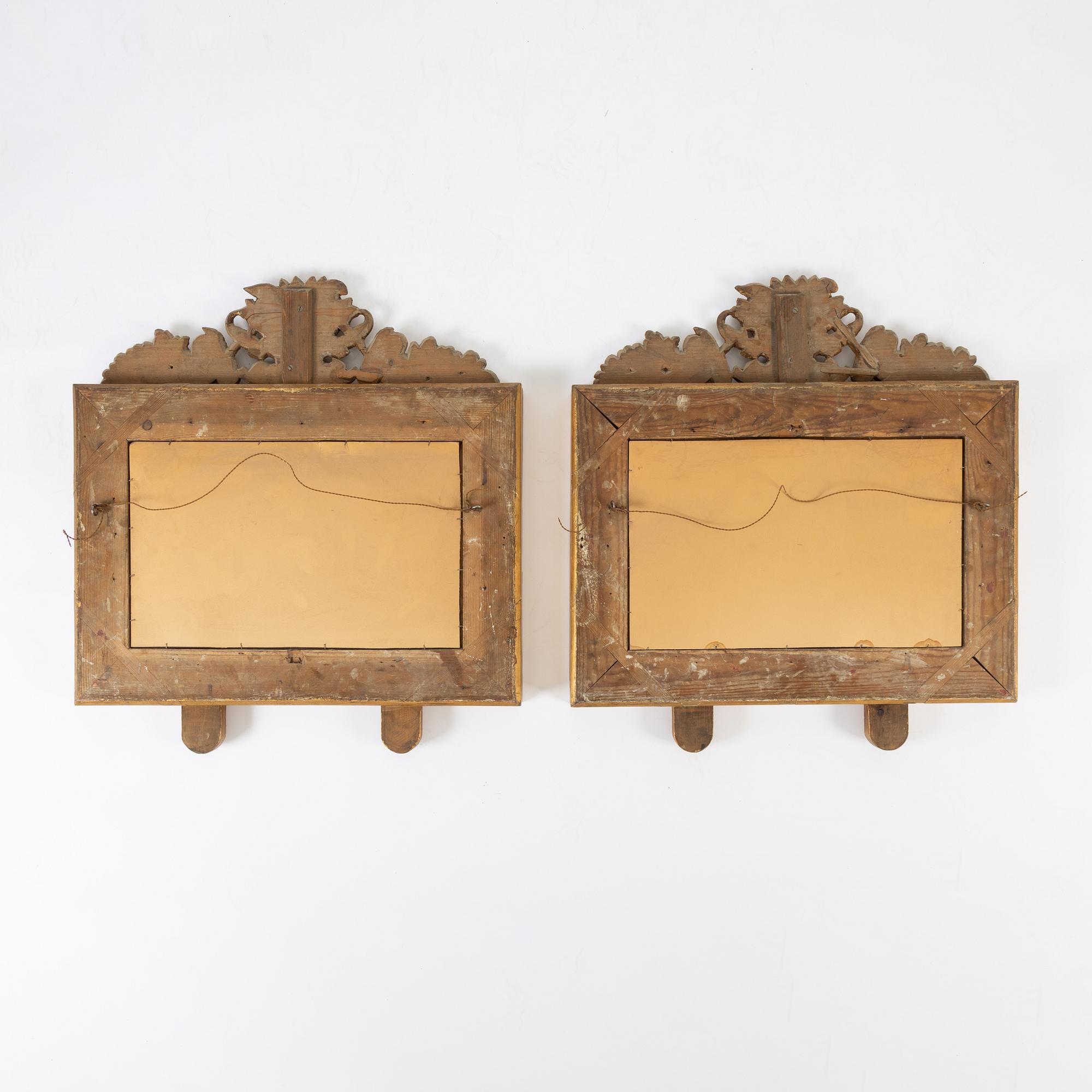 A pair of mirror sconces, First half of the 19th Century.