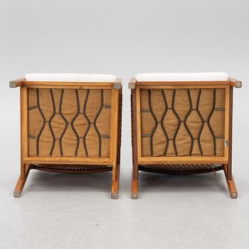 Carl Gustaf Hiort af Ornäs, a matched pair of 'Rialto' lounge chairs, Puunveisto Oy - Träsnideri Ab, Finland, mid-20th century.