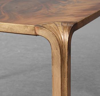 An Alvar Aalto mahogany and stained beech "Fan-leg table" by Artek, Finland.