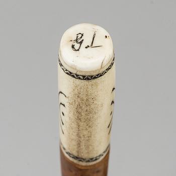 A Sami birch and reindeer horn mallet, signed GL.