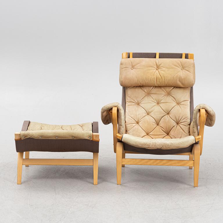 Bruno Mathsson, a "Pernilla" armchair with foot stool, Dux,