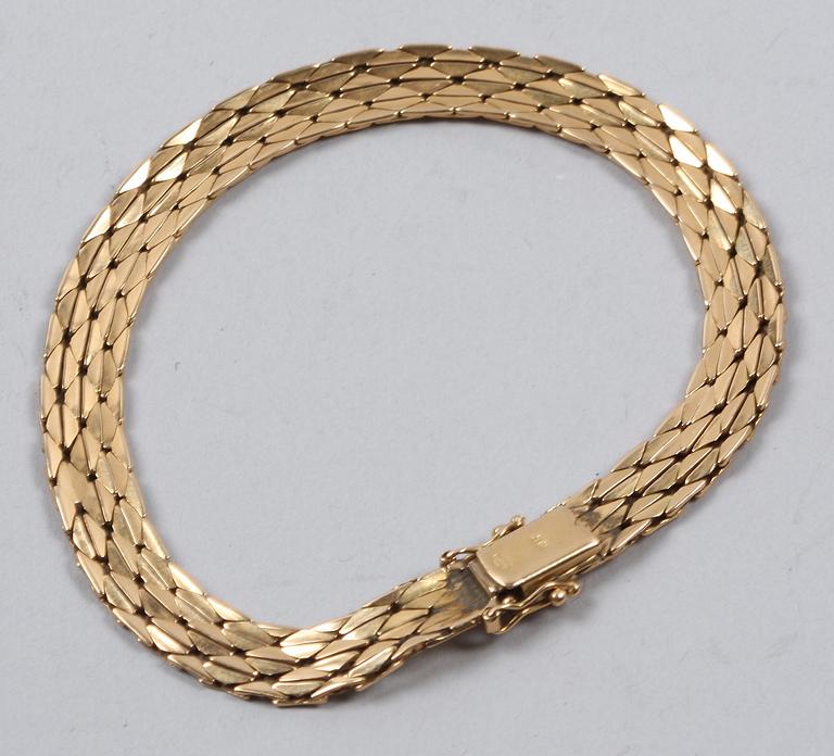 ARMBAND, 18K guld, 19 gram.