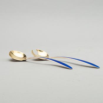 A pair of Norwegian David Andersen mid 20th century sterilng silver sallad-cutlery.