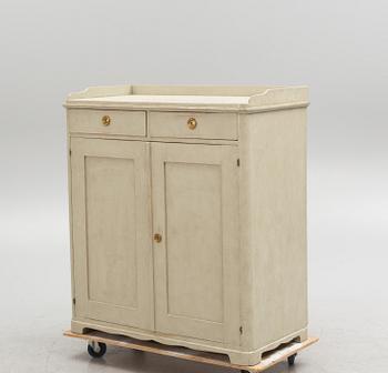 A painted 19th century cabinet.