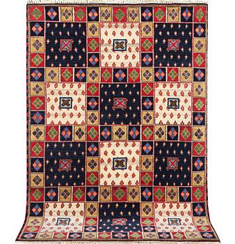 An oriental rug, c. 205 x 140 cm.