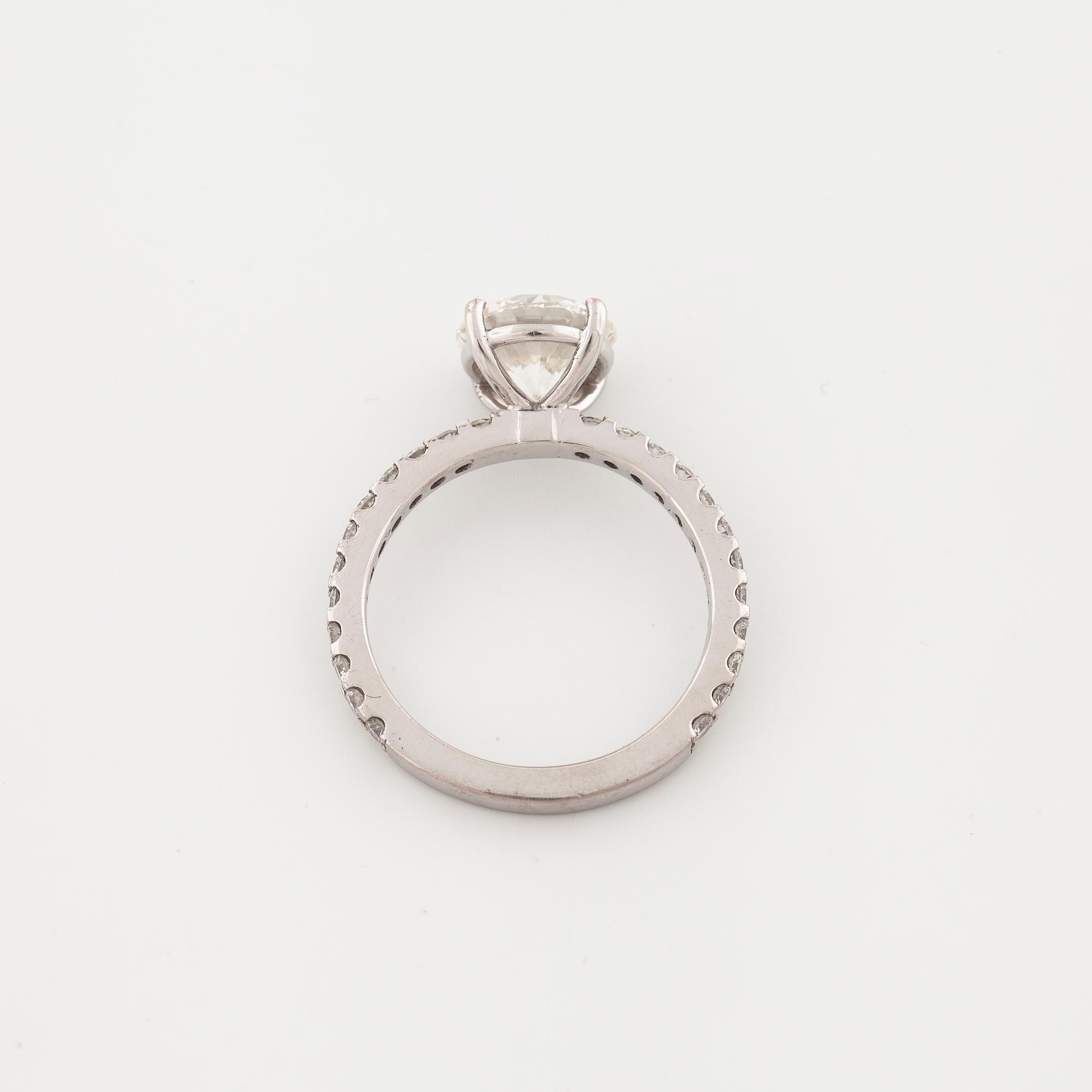 A brilliant cut diamond ring.