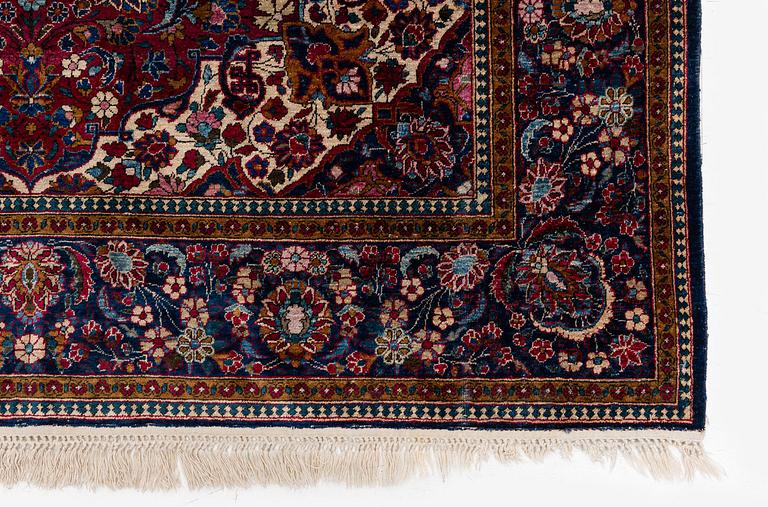 An antique silk Keshan, central Iran, c. 213 x 137 cm.