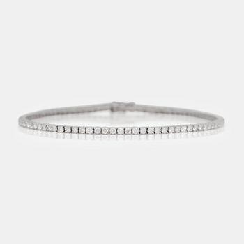 A brilliant-cut diamond line bracelet. Total carat weight of diamonds circa 2.70cts.