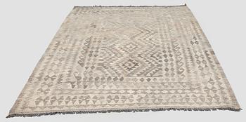 A Kilim carpet, ca. 262 x 176 cm.