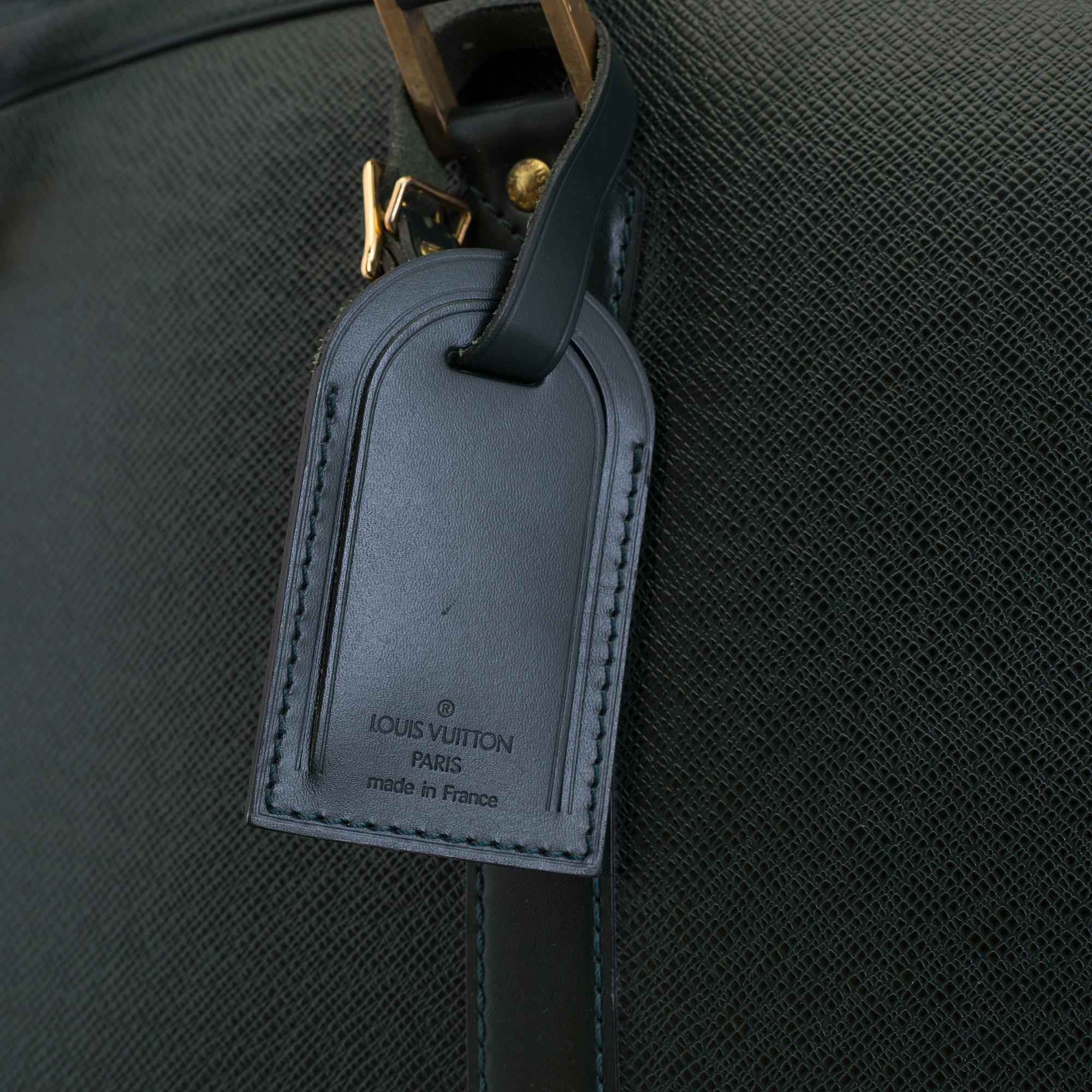LOUIS VUITTON, a taiga leather 'Helanga' weekend bag.