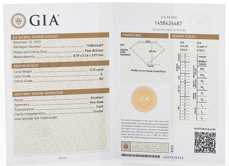 Ring, 18K vitguld med päronslipad diamant samt markis- och briljantslipade diamanter.