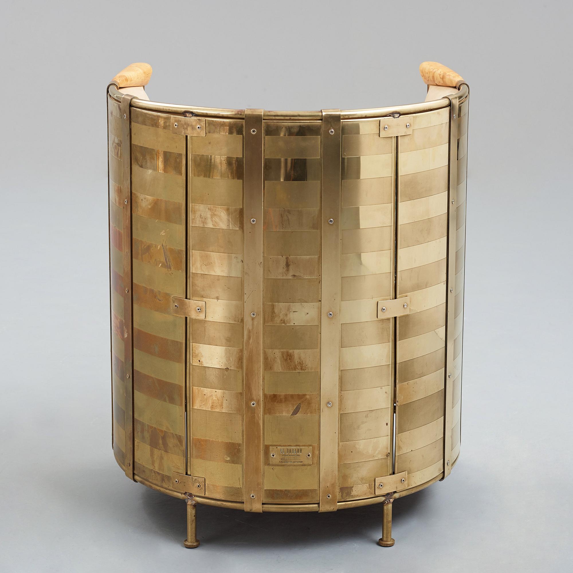 Mats Theselius, a brass "El Dorado" chair, Källemo Sweden post 2002.