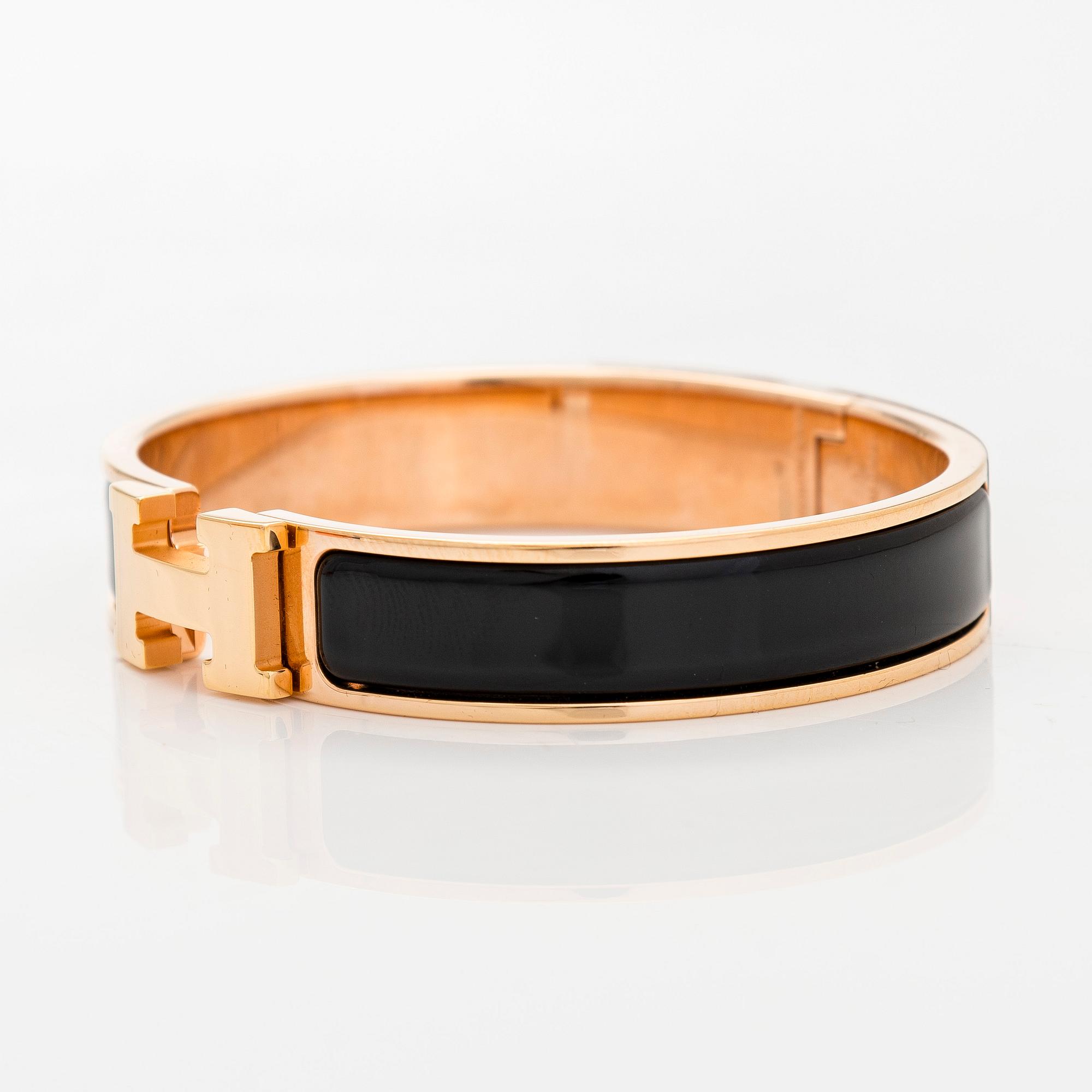 Hermès, a 'Clic H' bracelet.