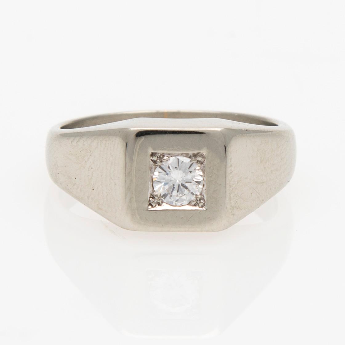 RING, briljantslipad diamant, 18K vitguld. A. Tillander  1975.