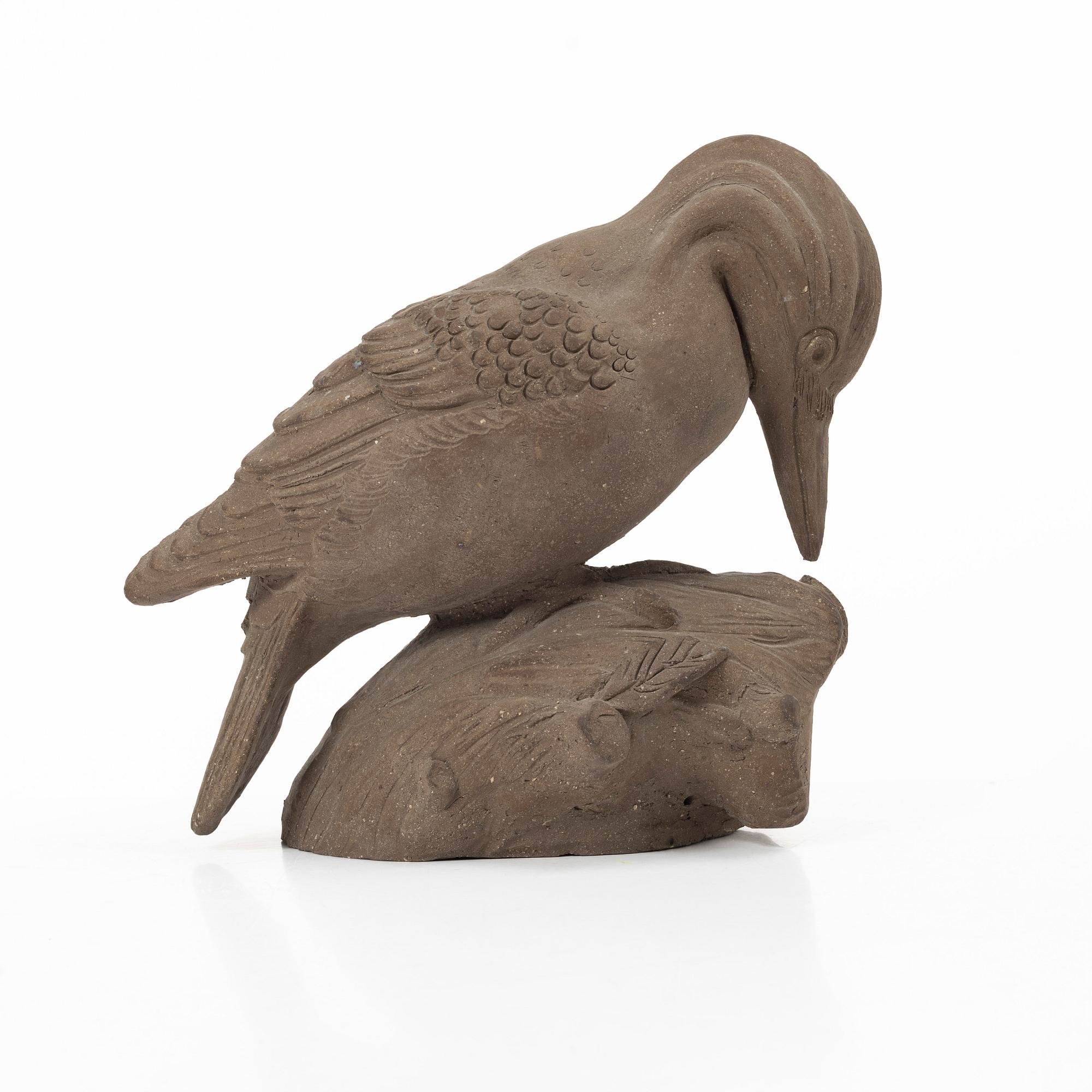 Tyra Lundgren, a stoneware sculpture of a woodpecker, executed in her own studio.