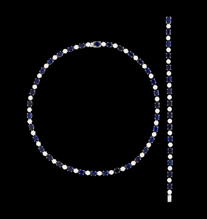 A white gold diamond and blue sapphire necklace and bracelet.
