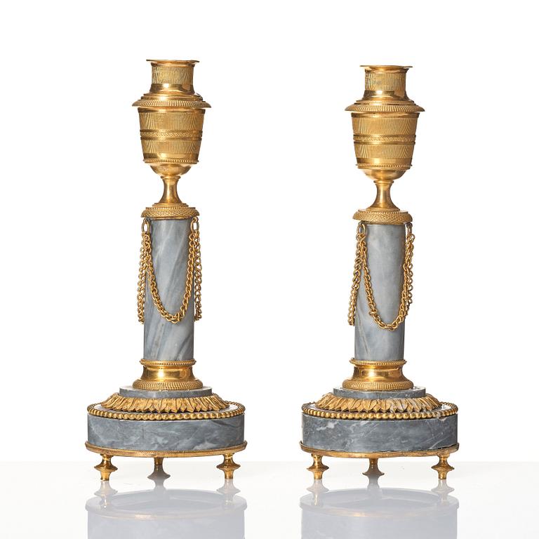 A pair of Louis XVI ormolu and marble cassolettes, late 18th century.