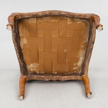 A pair of French Louis XV fauteuils, mid 18th century.