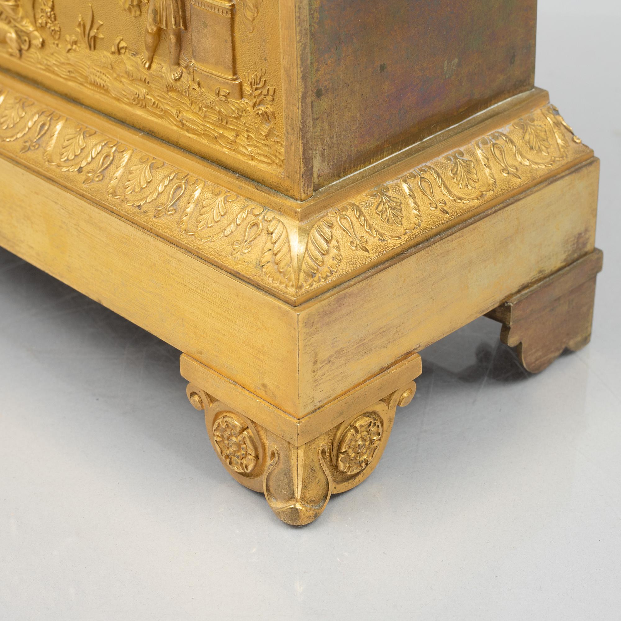An Empire mantel clock, first half of the 19th century.
