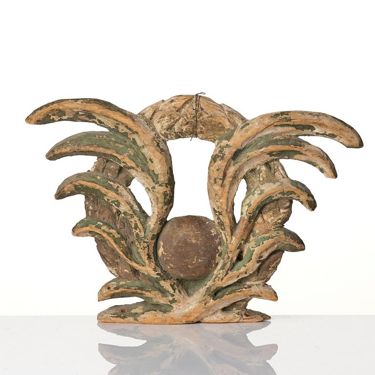 A Swedish baroque carved and painted wreath, later part 17th century.