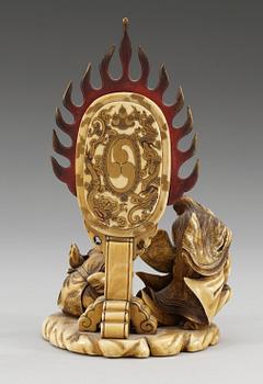 A Japanese lacquered ivory figure group, Meiji (1868-1912).