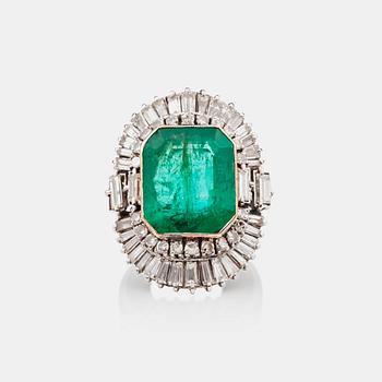 1136. An emerald-cut emerald and baguette-cut diamond ring.