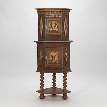 A Swedish corner cabinet from Dalarna dated 1734.