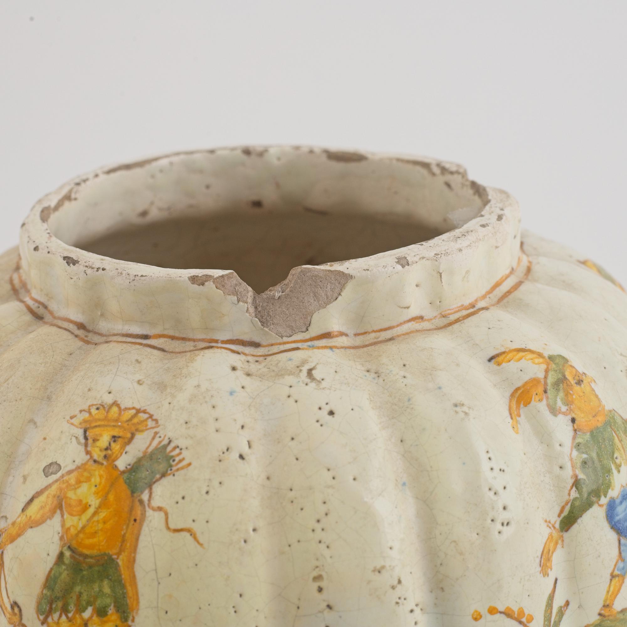 A faience pot, 18th century.